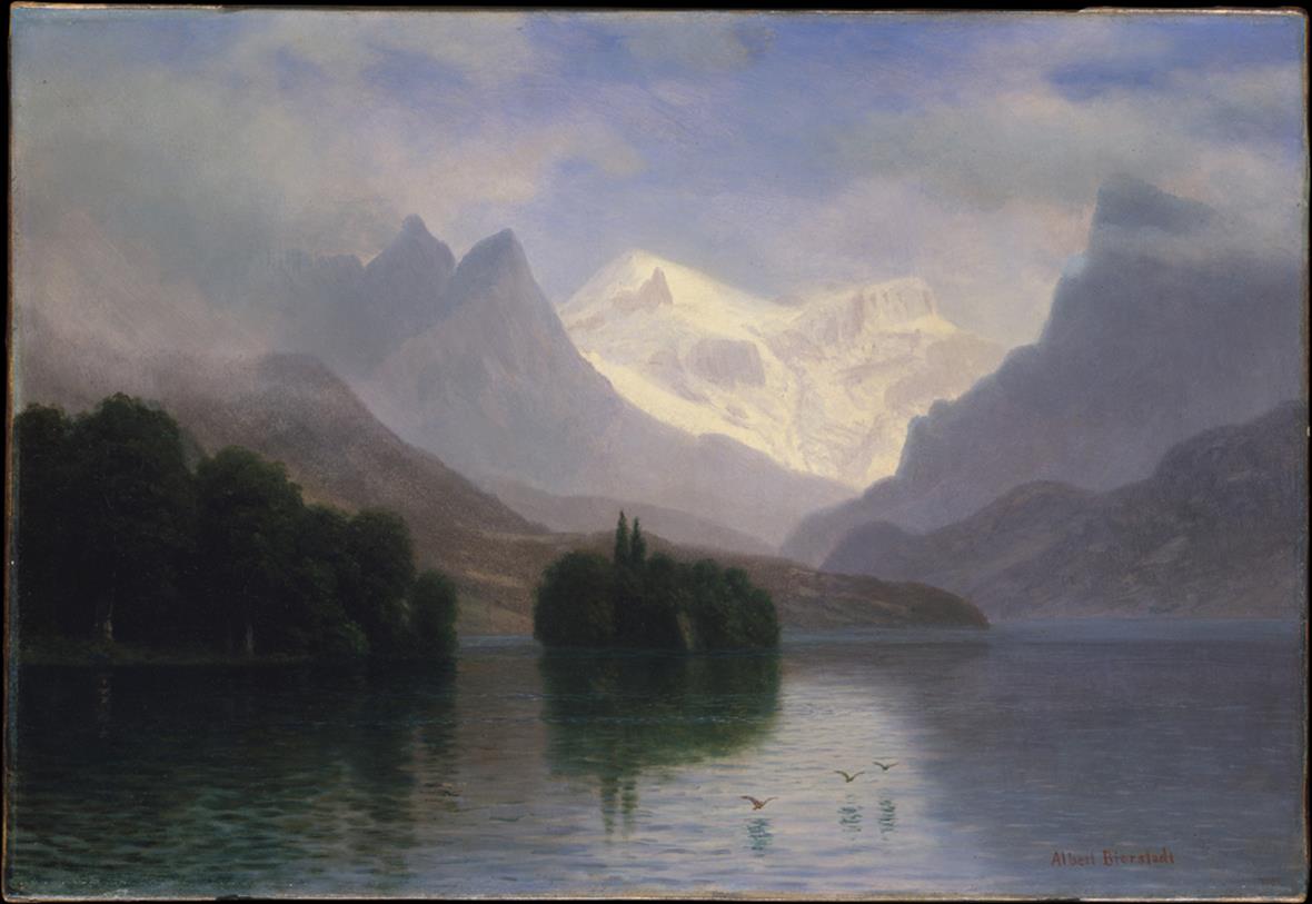 Mountains in front of a lake